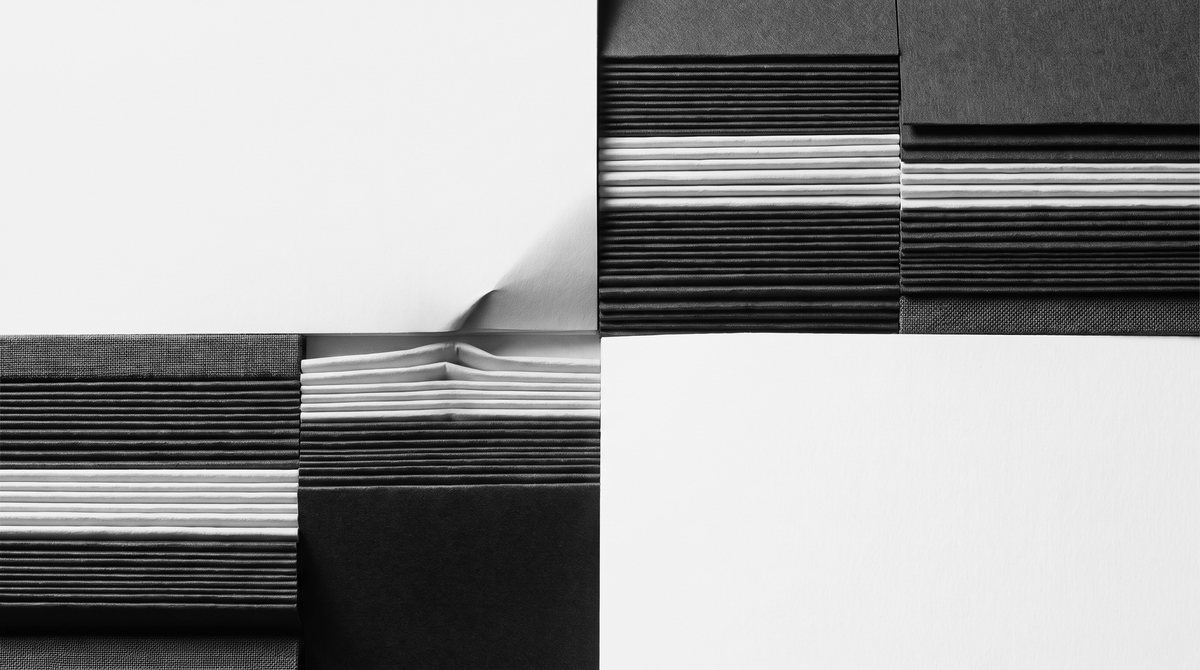 Editorial illustration — a meticulously aligned structural surface interrupted by a subtle discontinuity. Conceptual, not a chart or price data.