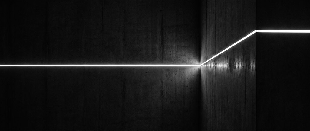 Conceptual editorial illustration — a single thin line of light cutting across a dark plane and changing direction. Monochrome study of conviction encountering a different perspective. Not a depiction of any person or event.