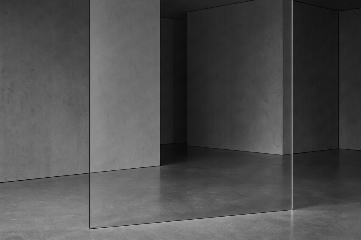Editorial illustration — a single clear glass surface in front of two heavily shadowed sculptural volumes receding behind it. Conceptual monochrome study of the interface and the institution it reveals. Not documentary.