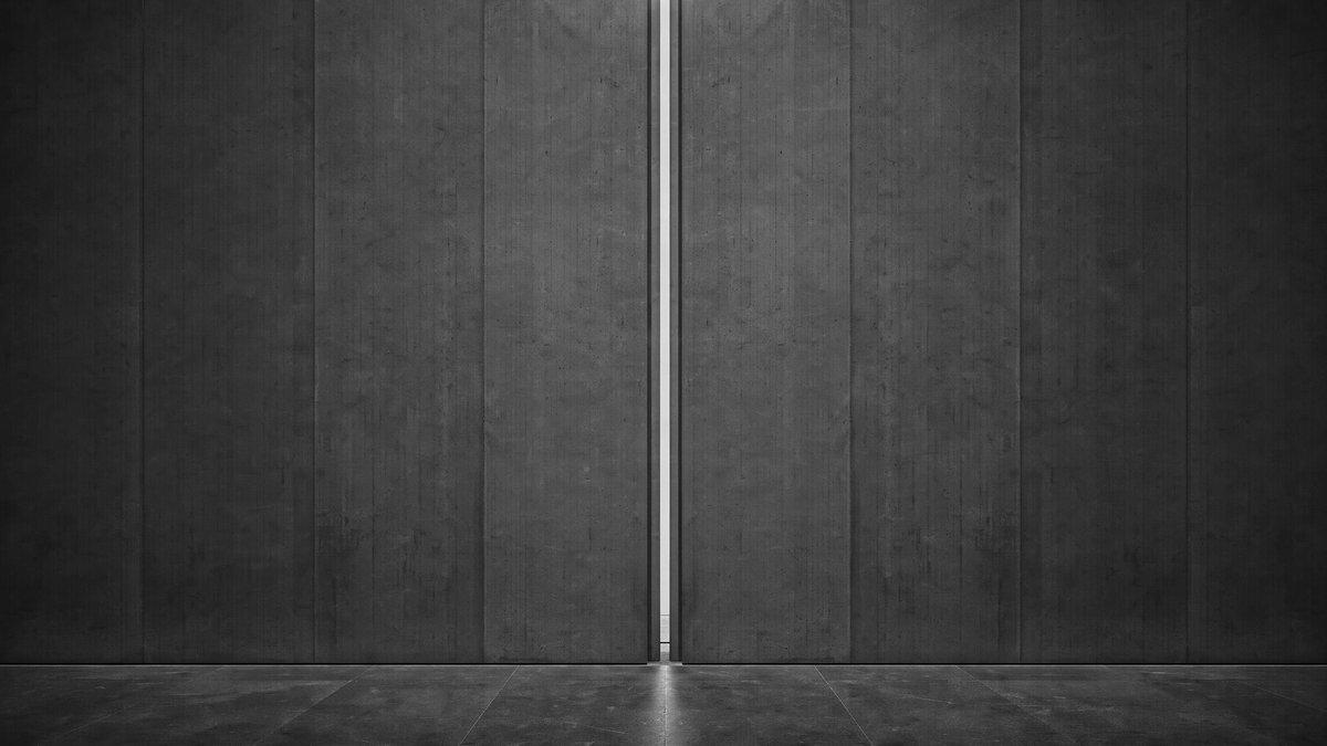 Editorial illustration — a towering dark wall split floor to ceiling by one precise narrow vertical seam of luminous light. Conceptual monochrome study of a decisive distinction cutting through a mass of material. Not documentary.